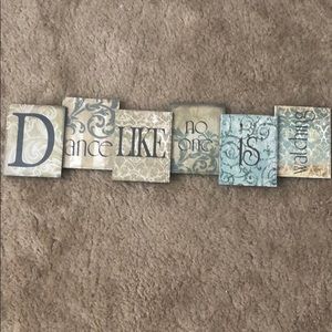 “Dance like no one is watching” wall decor.